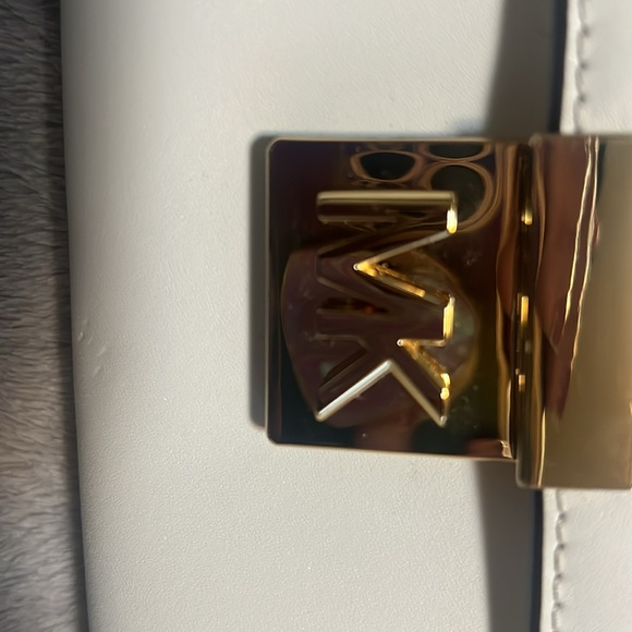 Cute white Micheal Kors bag. Small black dot in front and back seen in video - Picture 3 of 3